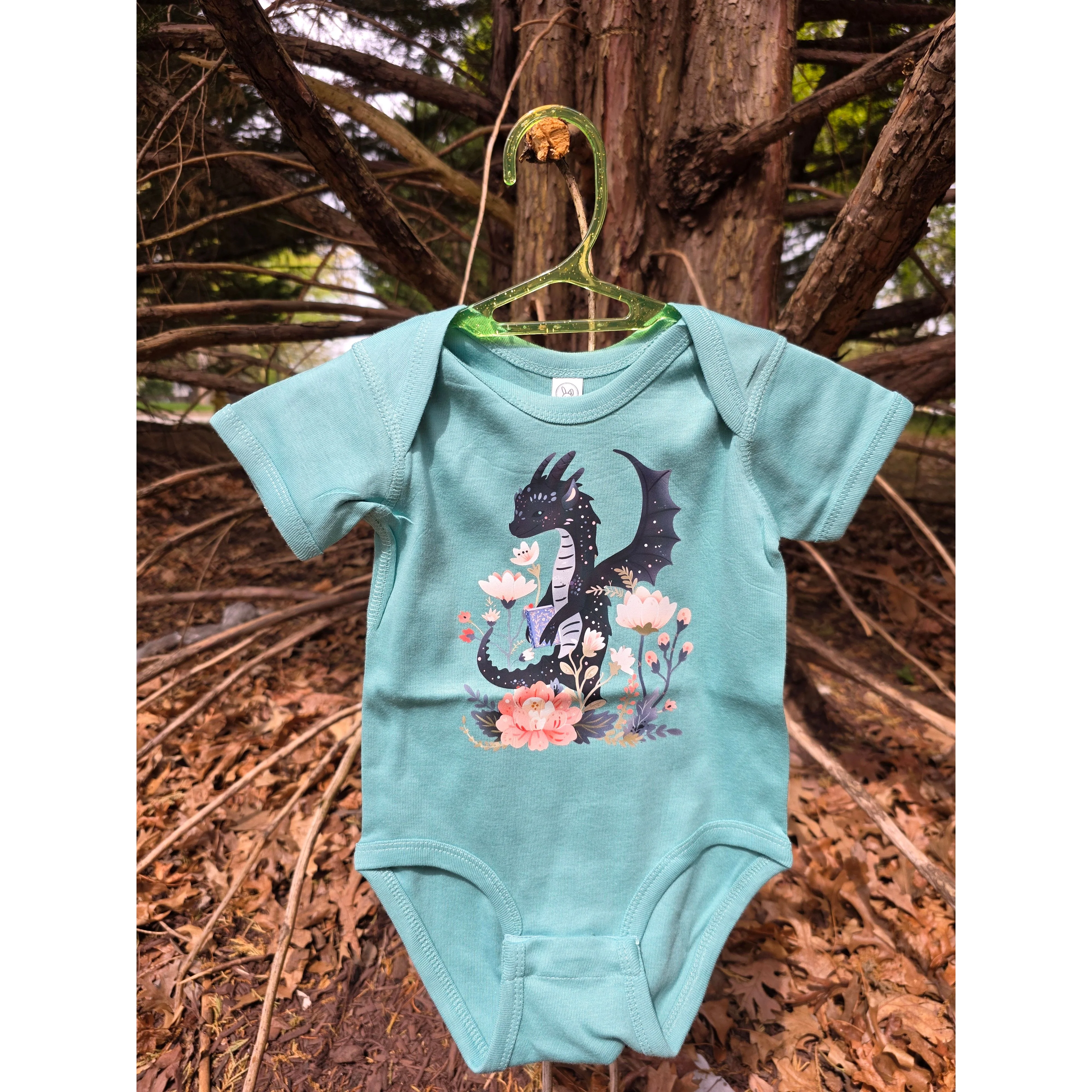 FLORAL READING DRAGON BABY ONESIE